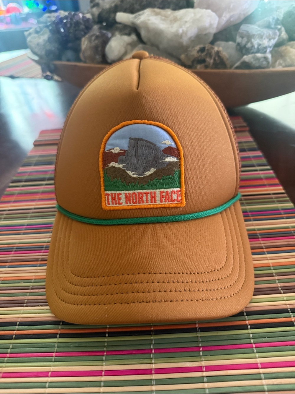 The North Face Tan Trucker Cap with Green Rope Accent